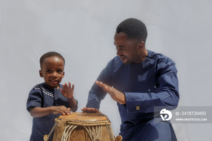 Father and son drumming