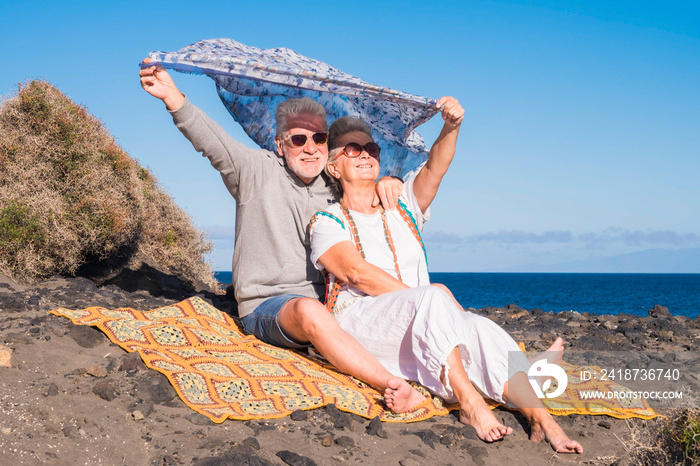 Adults caucasian couple having fun and enjoy the outdoor leisure activity together in the nature nea