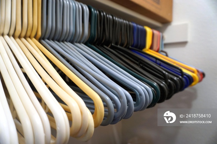 Plastic hangers in empty closet