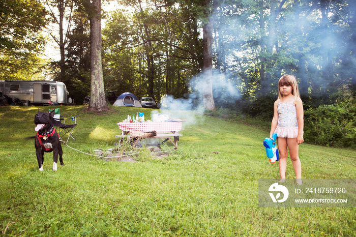 Portrait of girl with squirt gun