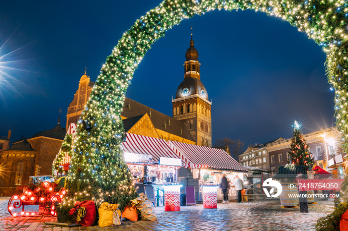 Riga, Latvia. Christmas Market On Dome Square With Riga Dome Cathedral. Christmas Tree And Trading H