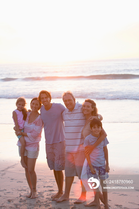 Portrait happy multi-generation family on beach