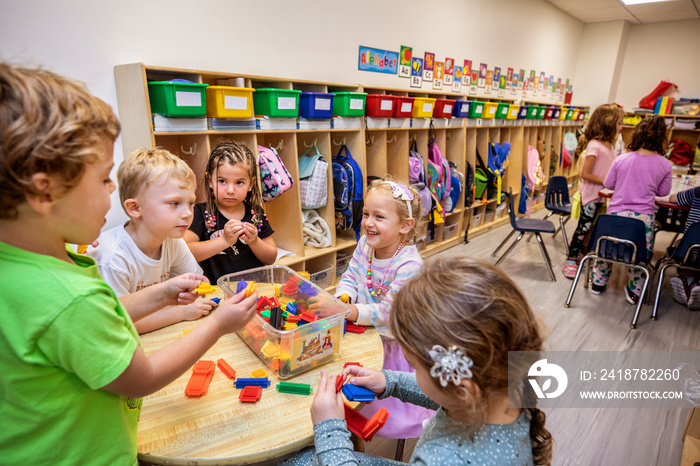 Children playing with puzzle pieces