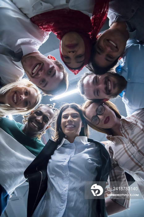 multiethnic Group of young business people celebrating success