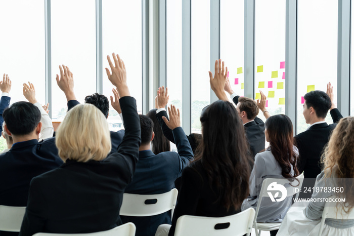 Group of business people meeting in a seminar conference . Audience listening to instructor in emplo