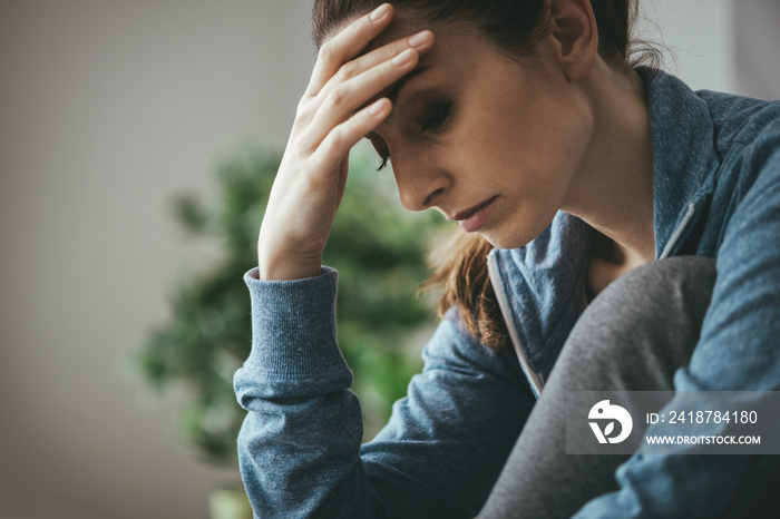 Depressed woman at home