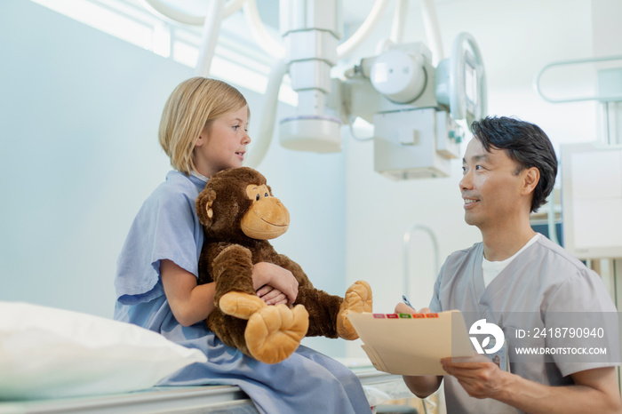 Young female patient with her stuffed animal