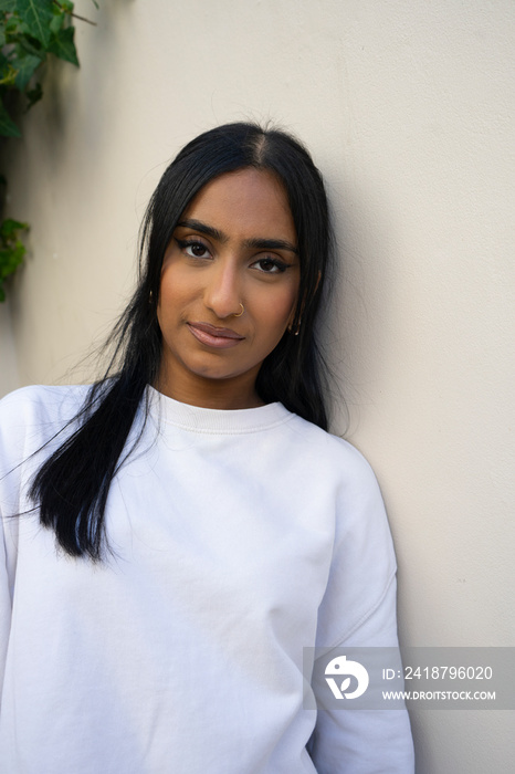 Portrait of woman in white shirt