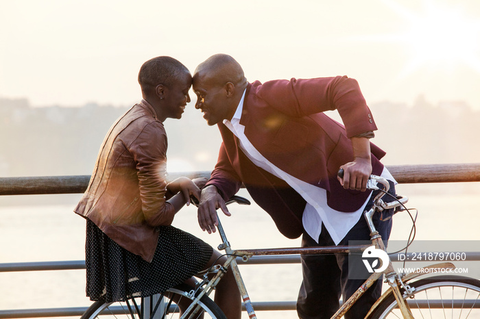 Couple together on one bike