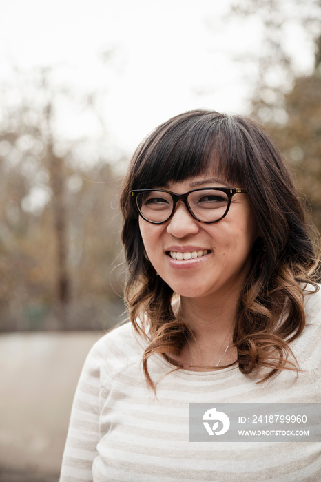 Portrait of mid adult woman in park