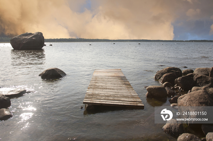 Pier Floating on a Rocky Shore