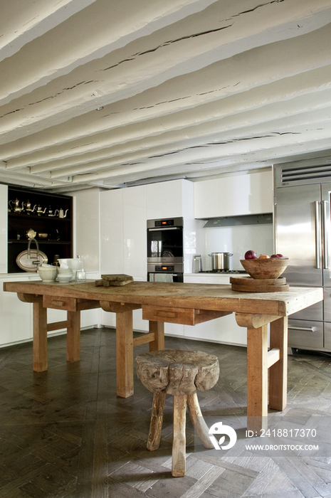 Wooden table and stool in kitchen