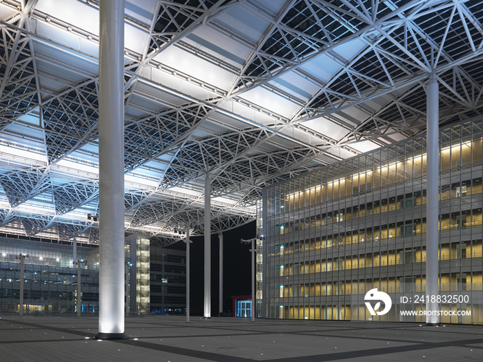 Walkway with columned ceiling in modern office building