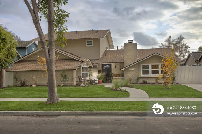 Exterior of two story house; California; United States of America