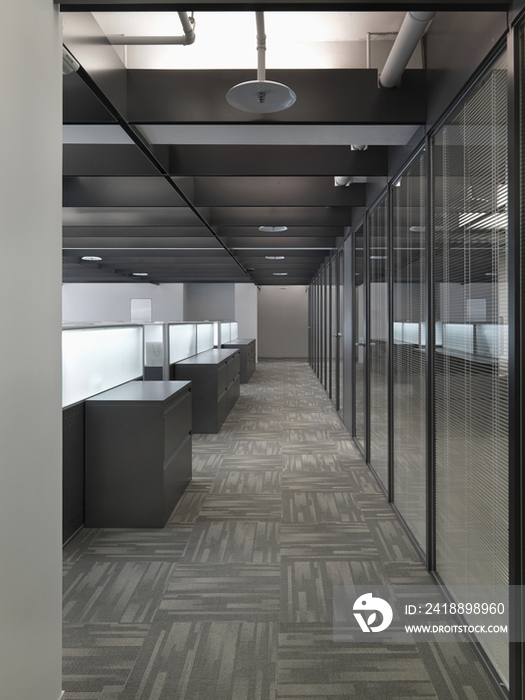 Interior of a contemporary office space with cubicles