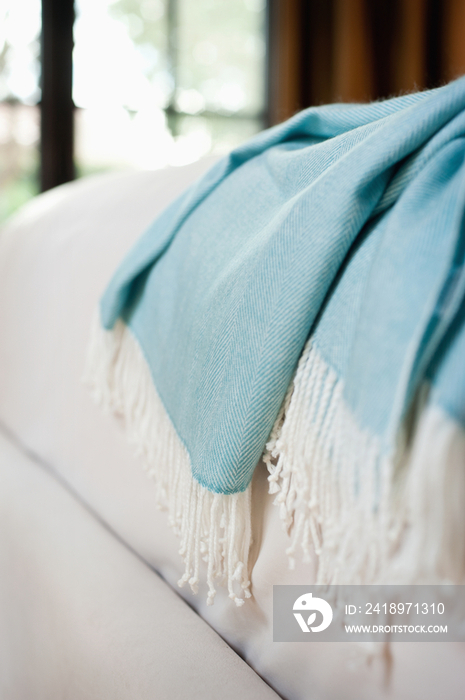 Extreme close-up of shawl on bed at home