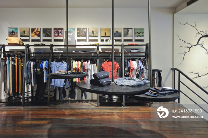 Clothes displayed in contemporary clothing store