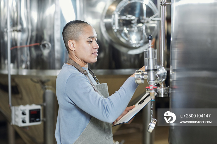 Side view portrait of female brewmaster