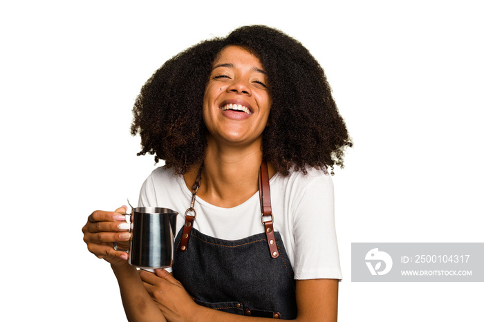 Young African American woman barista isolated laughing and having fun.