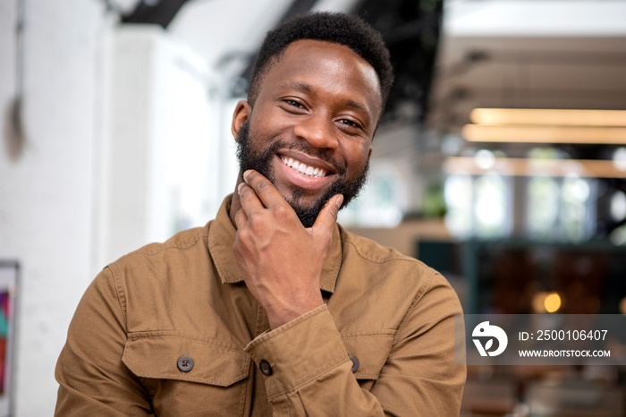 Portrait of smiling man at home