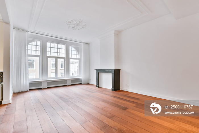 UPretty interior of unfurnished living room with fireplace