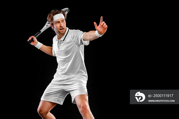 Tennis player with racket in white costume. Man athlete playing isolated on black background.