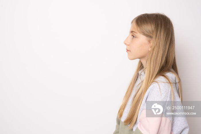 Close up side profile photo beautiful girl standing isolated over white background.