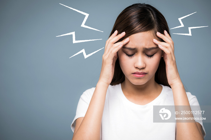 young woman having a headache.