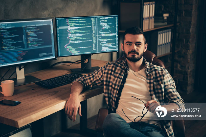 Portrait of his he nice attractive content bearded guy wearing checked shirt expert specialist nerd student internship at wooden industrial interior work place station indoors