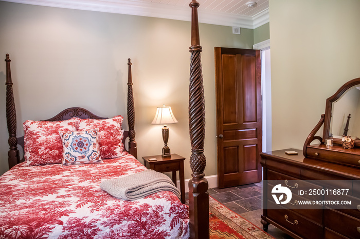 Red Toile formal guest bedroom with traditional decoration