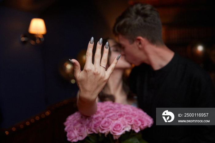 Happy Woman Shows  Engagement Ring After Proposal