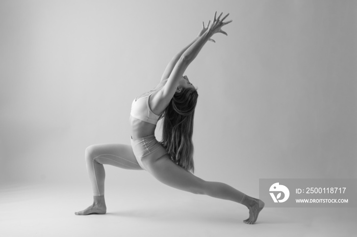 Woman doing a Yoga pose. black and white photo