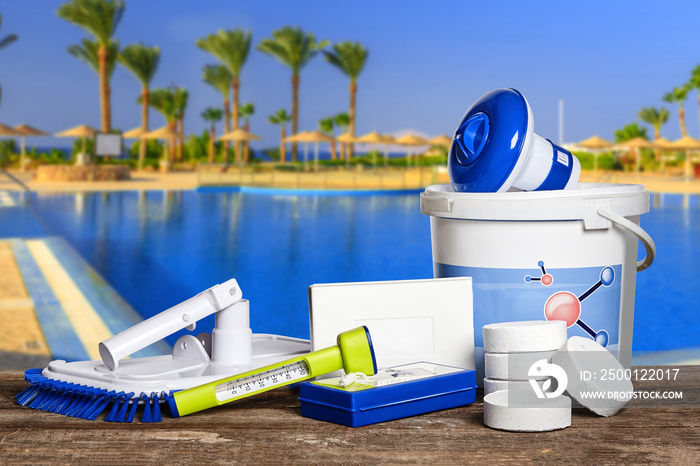 Equipment with chemical cleaning products and tools for the maintenance of the swimming pool.