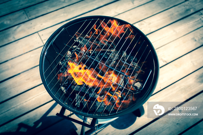 Charcoal grill on the pier. Sotkamo, Finland.