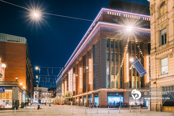 Helsinki, Finland. Building Of Department Store On Keskuskatu Street In Evening Or Night Christmas Xmas New Year Festive Illumination