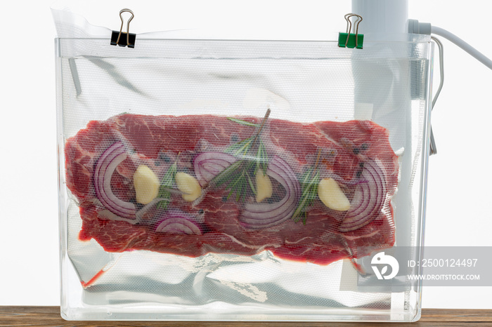 Portion of flat iron beef steak sous-vide cooking