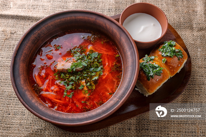 Ukrainian borscht with donuts with garlic and sour cream