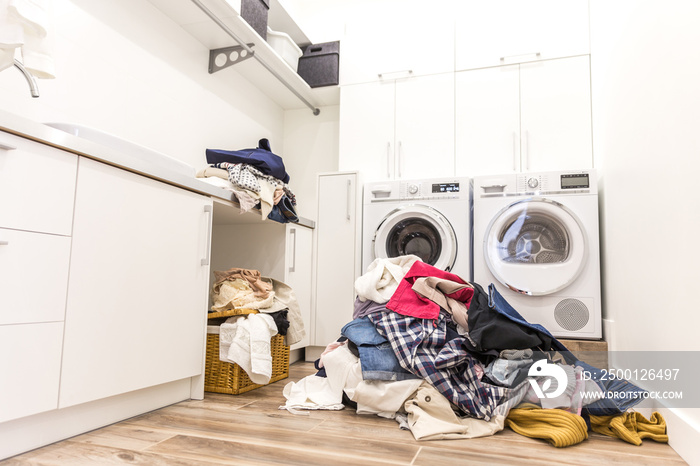 Laudry room with a pile of dirty clothes