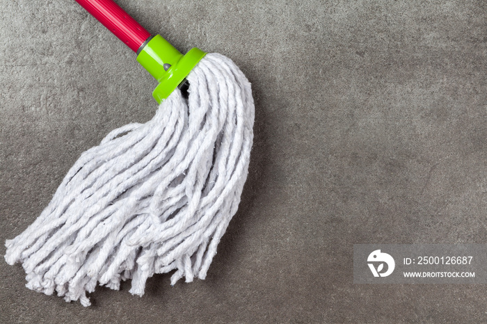 Cleaning supplies on grey background