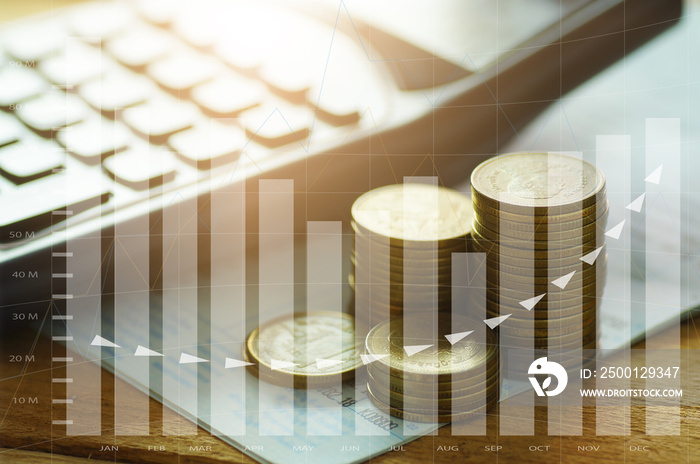 money coins stacked with calculator on book bank and capital finance with graph concept