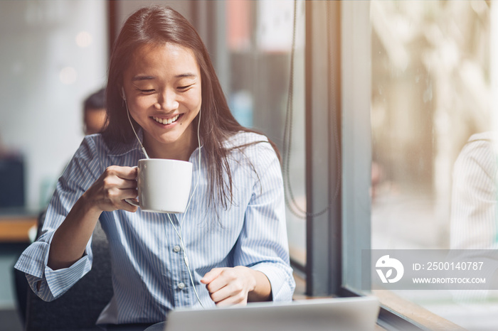 Listen attentively. Cheerful girl working at a coffee shop. Concept of female freelancer business. Copy space on the right side