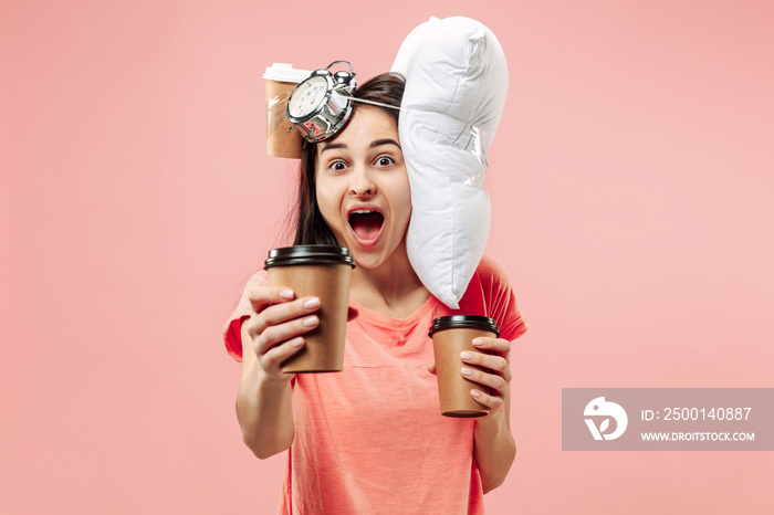 Tired happy woman drinking coffee at home or office having too much work. Bored businesswoman with pillow and coffee cups. The busy, boring, worried, be late, concerned, sleep day, introuble concept