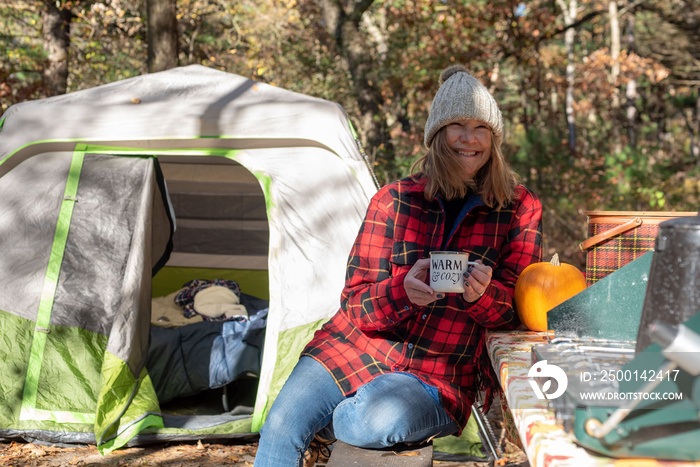 fall camping with coffee in morning