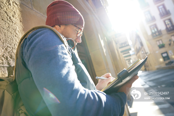 Photo reporter writing notes on photo tour