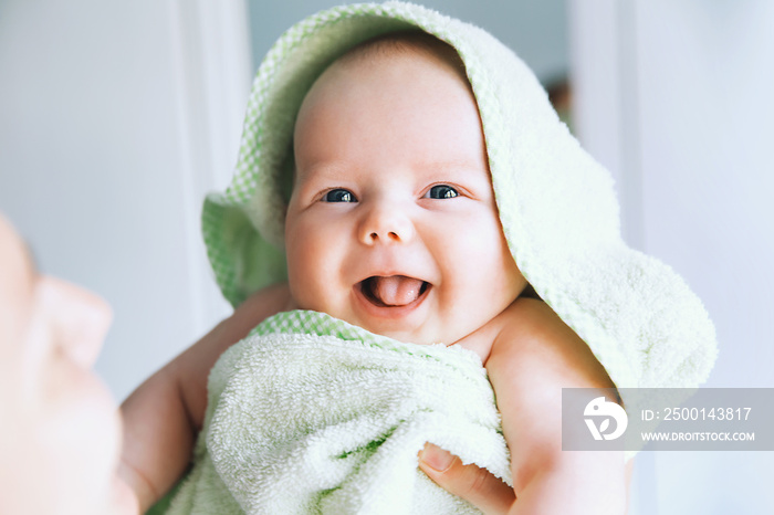 Cutest baby after bath with towel on head.