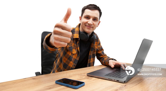 Employee IT specialist sit at work with laptop and  show thumb up gesture on a transparent background