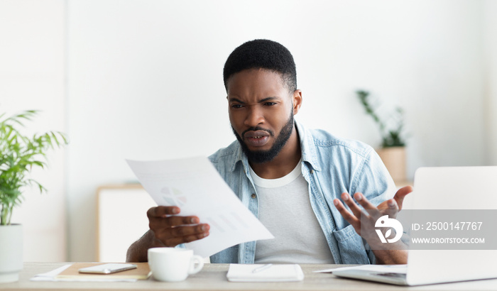 Frustrated employee shocked by reading financial report of his company