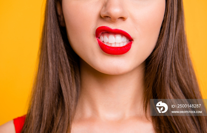 Close up cropped photo of big full natural lips brunette hair isolated on vivid yellow background