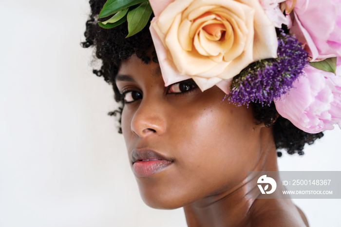 Black woman with afro and flower crown