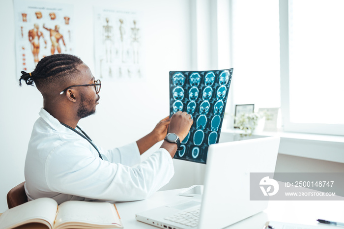 Medical Brain concept. Doctor check up x-ray film of the brain patient by mri scan at hospital. Doctor give advice to patient about MRI (Xray) brain Scans.